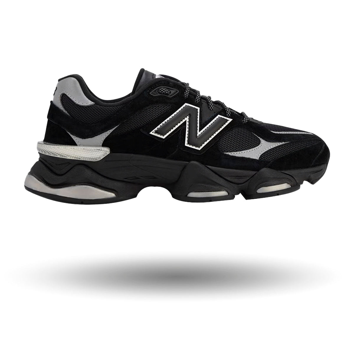 Black athletic shoe with gray accents on a white background