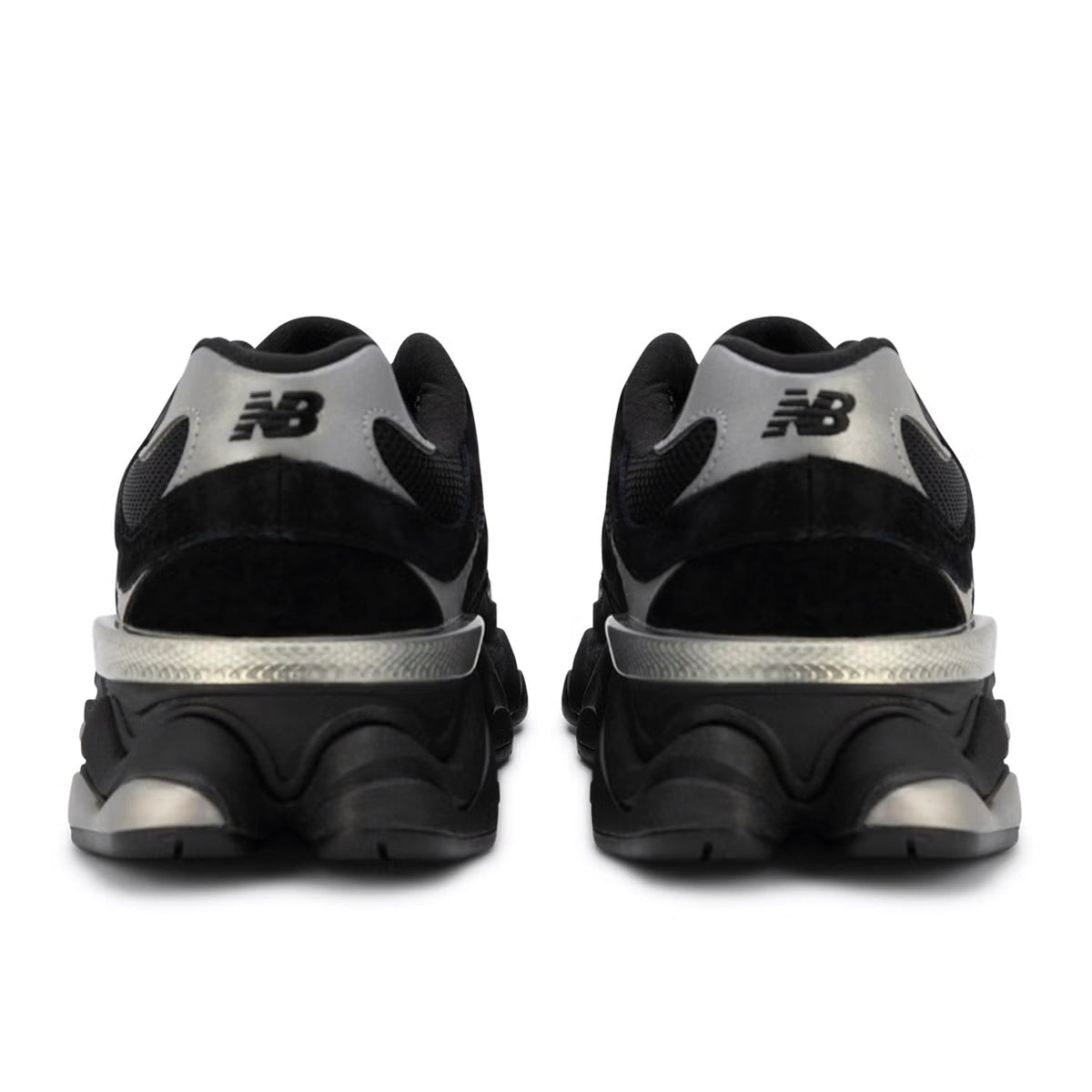 Black and silver New Balance sneakers on a white background