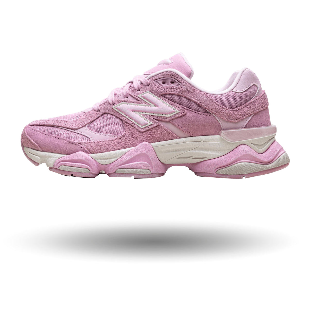 Pink sneaker with white sole on a white background