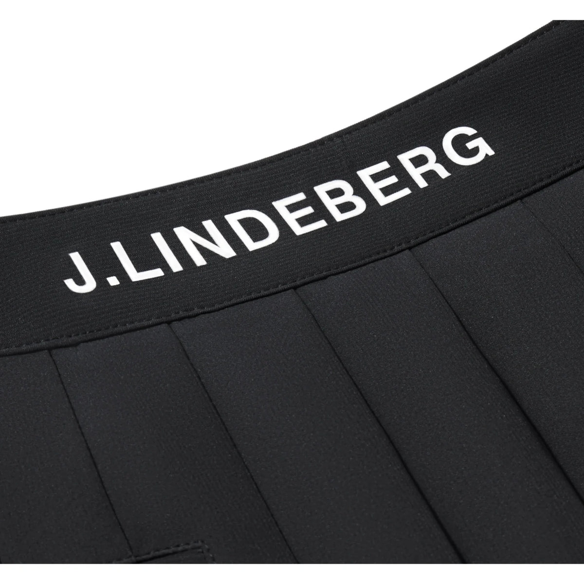 J.Lindeberg Harlow Golf Skirt with stripe hem and integrated inner shorts.