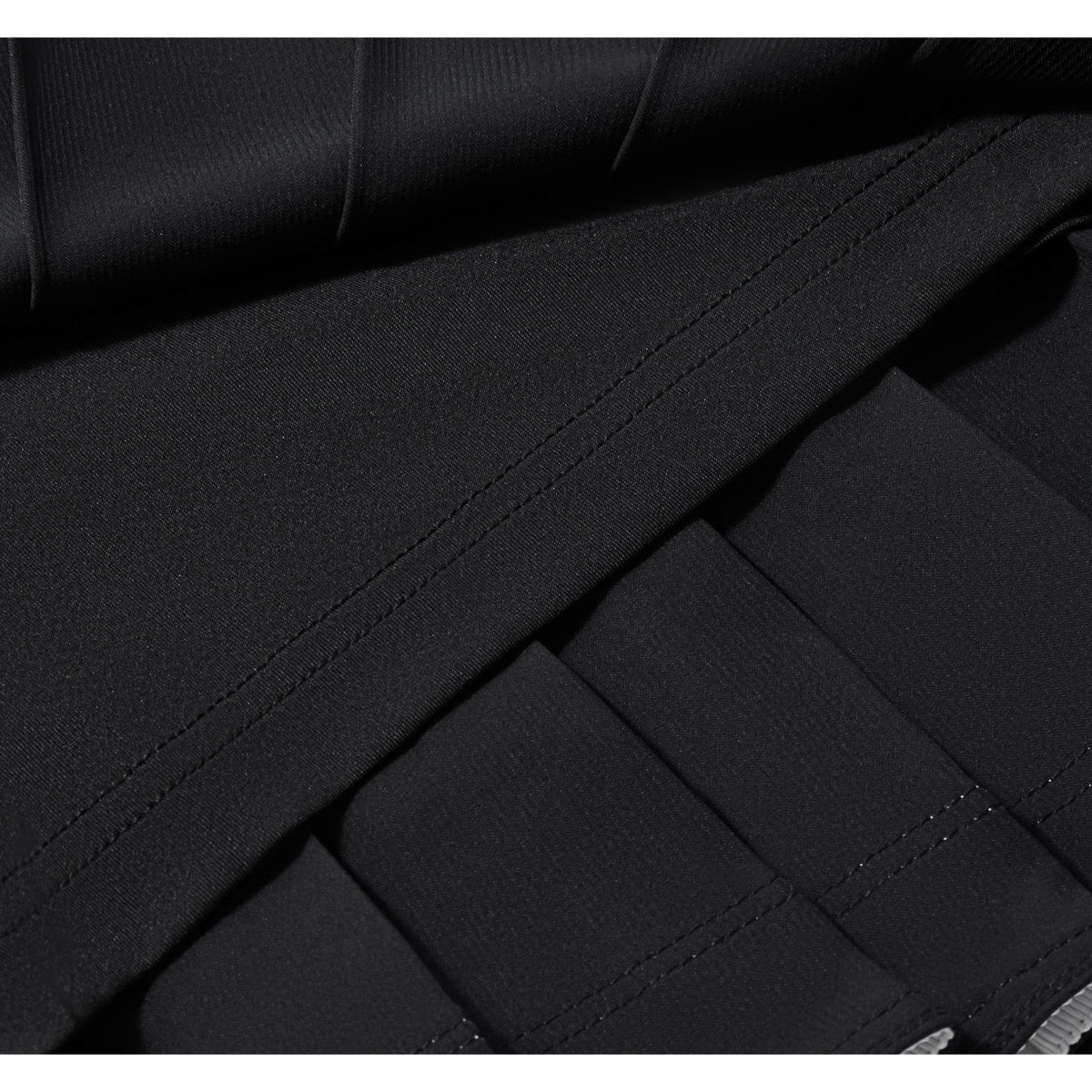 J.Lindeberg Harlow Golf Skirt with stripe hem and integrated inner shorts.