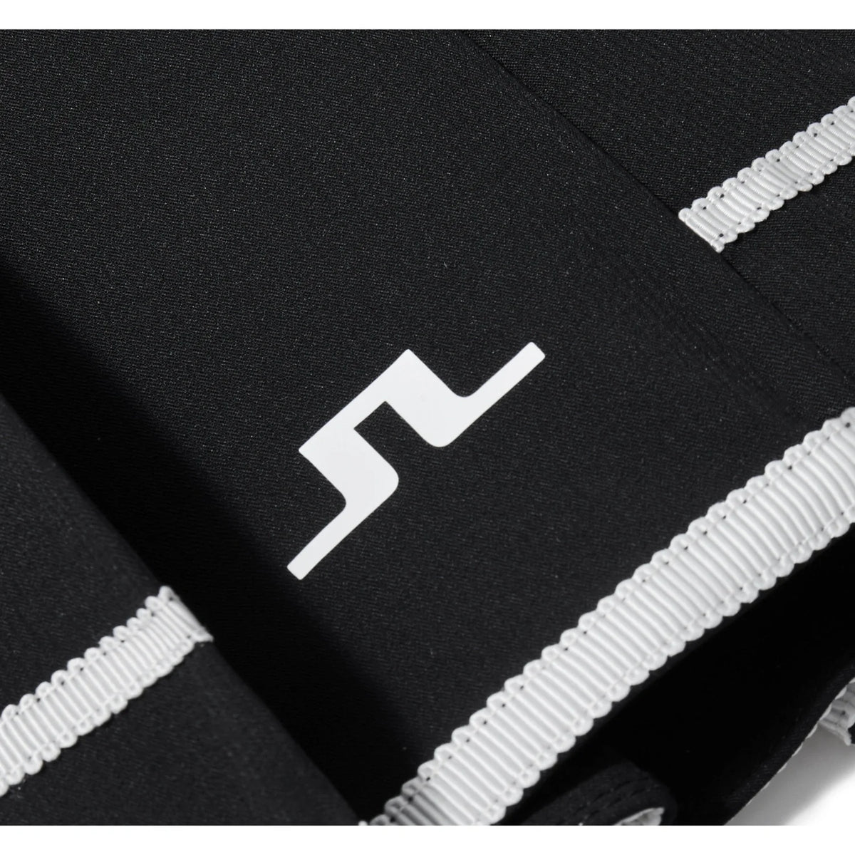 J.Lindeberg Harlow Golf Skirt with stripe hem and integrated inner shorts.